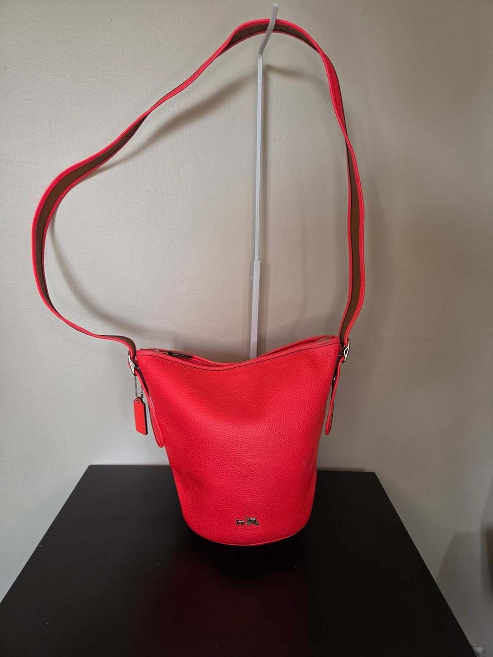 Coach Polished Pebble Leather Mini Duffle crossbody, neon pink